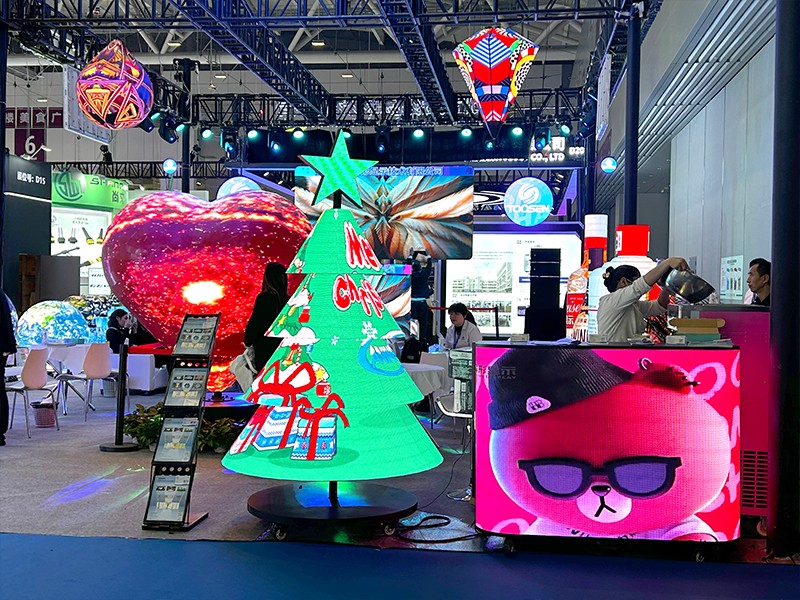 TOOSEN exhibition booth featuring hexagonal LED wall and globe LED displays